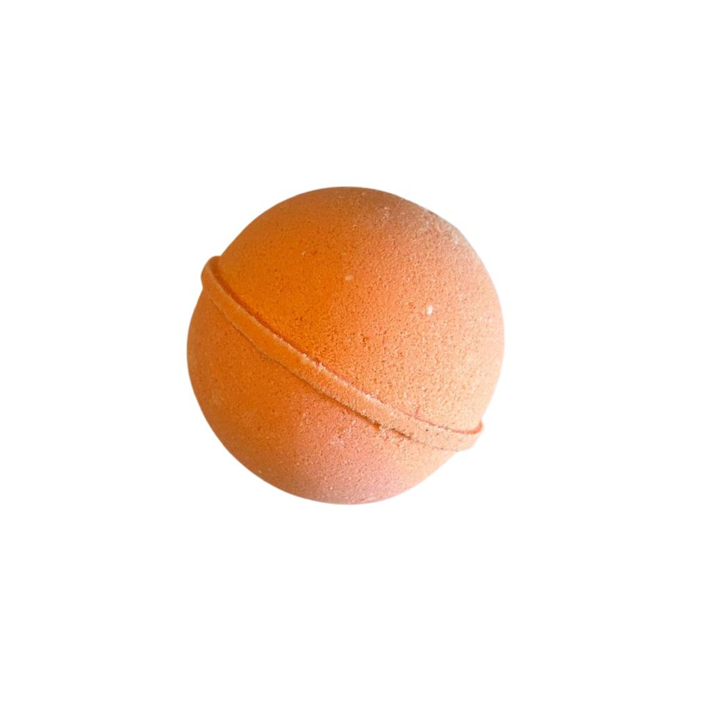 orange colored bath bomb with mango scent